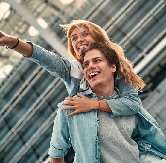 Summer time. Beautiful young couple enjoying in good mood. Lifestyle, love, dating concept.